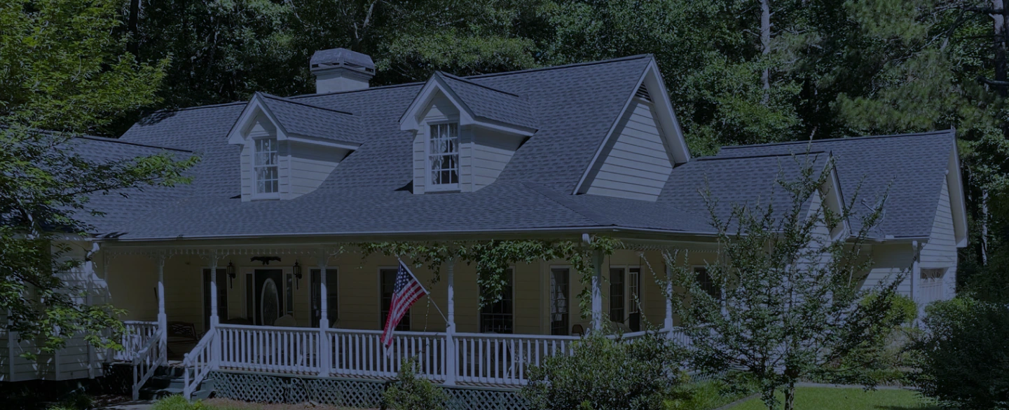 beautiful veteran house with shingle roofing